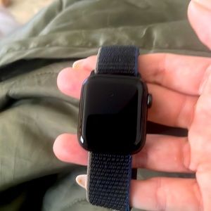 Apple SE 40mm smart watch in titanium black